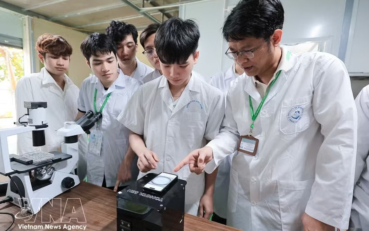 Students and educators in a Vietnamese higher-education setting focused on skilled workforce development.